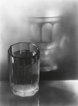 I love this photograph of Josef Sudek, it's apparently a water filled glass reflected in a misted window, but the reflected glass looks quite different to its parent.